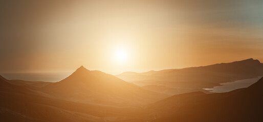 Fototapeta na wymiar Fantastic landscape with mountain range and epic orange sunset sky. Patagonia south america