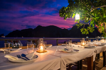 Dinner table by Phi Phi Don sea view at sunset