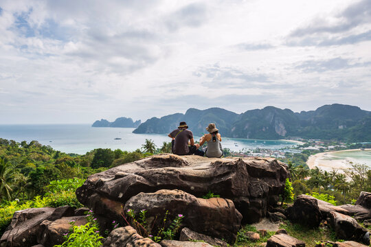 Tourist couple enjoy Phi Phi Don viewpoint, Krabi