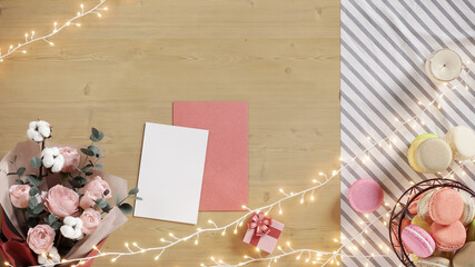 Composition for valentine's day blank card on  wooden table with mockup space premium photo