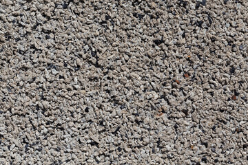 Crushed granite stones wall - close up