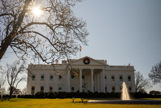 Low Angle View Of US Presidents Home And Fountain, The White House In Washington, DC.