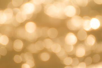 Abstract orange or gold bokeh background 
