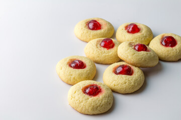 cherry thumb cookies isolated on white with selective focus