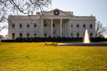Low angle view of US Presidents home and fountain, the White House in Washington, DC.