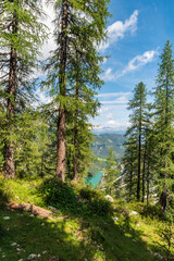 Fototapeta na wymiar Pragser Wildsee lake from Alta Via 1 trail between Pragser Wildsee and Seekofelhutte in the Dolomites