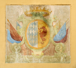 Fresco coat of arms with seahorse and crown in pastel colours, Garda Lake, Italy