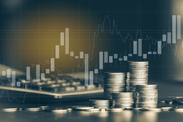 Stack of money coin with trading graph, financial investment concept use for background