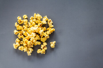 Popcorn on grey background with copy space