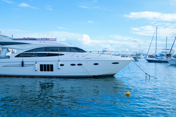 Beautiful yacht stands in the boat parking.