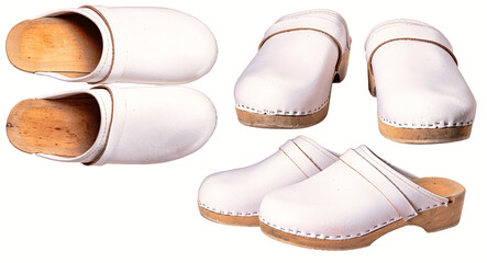 Wooden clogs with white leather upholstery intended for medical personnel. - obrazy, fototapety, plakaty