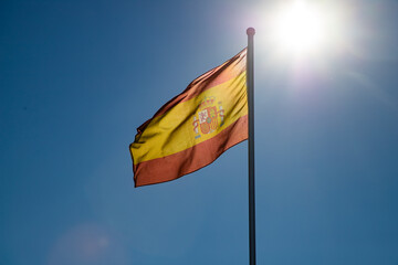 spanish flag on blue background