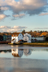 Woodbridge Tide Mill in Woodbridge, Suffolk, on the banks of the River Deben, England. A rare example of a tide mill were the water wheel still turns