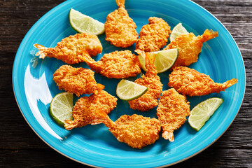 Crispy Fried Butterfly Shrimp on a blue plate