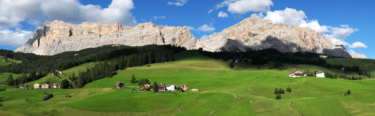 Beautiful panoramic view of the Dolomite group of the Sasso di Santa Croce or 'Rosskofel' in Val Badia. South Tyrol Italy. Is an imposing mountain massif that rises up to 2,907 m above sea level. - obrazy, fototapety, plakaty