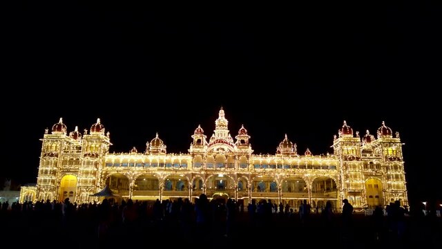 A Bewitching dusk view of the famous landmark the Ambavilas Royal Palace in Mysore seen illuminated and is an important travel destination in Karnataka, India.
