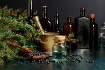 Juniper tincture with seeds and branches.
