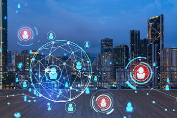 Rooftop with wooden terrace, Kuala Lumpur night skyline. Recruitment process to hire candidates for international business consulting. HR, networking digital icons. City downtown. Double exposure.