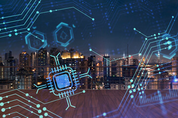 Rooftop with wooden terrace, Kuala Lumpur night skyline. Hi tech digital holograms to optimize business process by applying new technologies. City downtown. Double exposure.