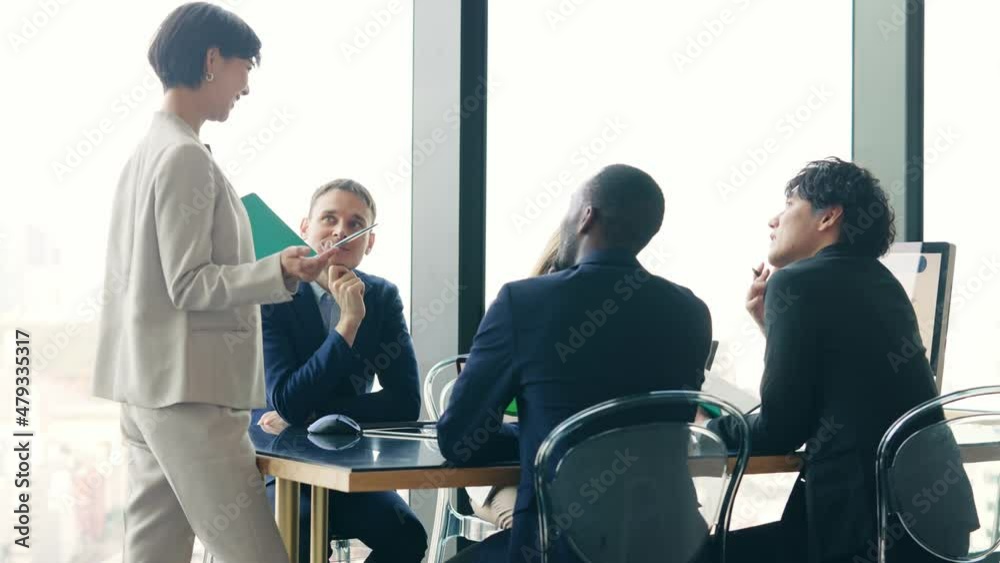 Wall mural Group of multi racial people meeting in the office. Global business.