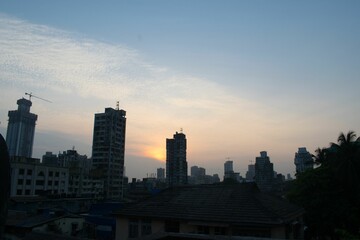 Fototapeta na wymiar Sunset skyline of urban city