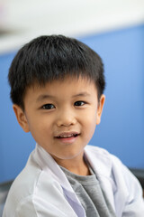 Asian kid check up with dentist at the dental clinic. Concept of dental check up and healthcare