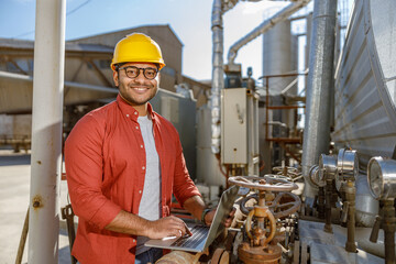 Photo of happy male multiethnic worker in plant