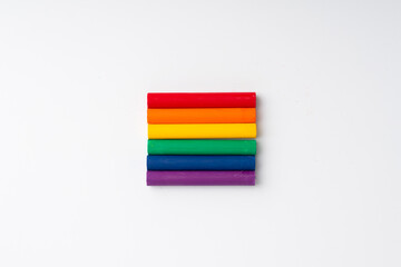 LGBTQ flag and symbol on table top view