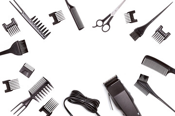 Professional hair clipper with set of nozzles of different sizes isolated on white background. Top view. Copy space for text