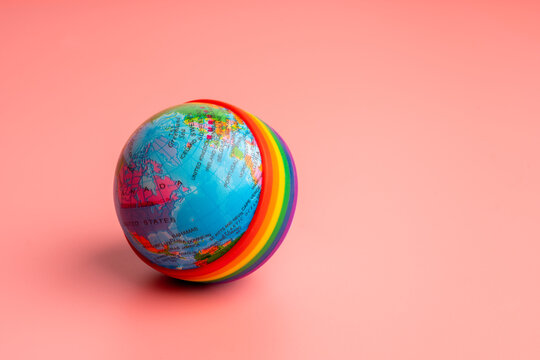 LGBTQ flag and symbol on table top view