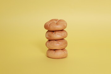 pyramid of buns on the yellow background
