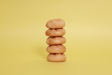 pyramid of buns on the yellow background
