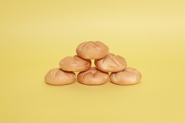 pyramid of buns on the yellow background