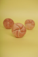 three buns on the yellow background
