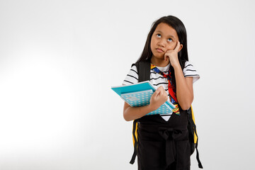 Asian Student girl standing thinking face and holding school supplies with backpack on white background,