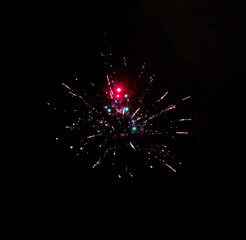 single red and golden firework at night