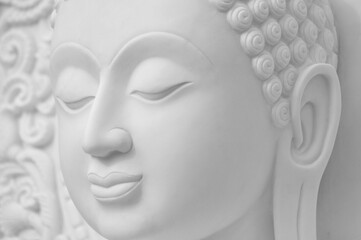 face of white stone buddha