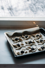 Scandinavian pastry Joulutorttu is traditional finnish and Swedish christmas pastry. It is traditionally made from puff pastry in the shape of a star or pinwheel and filled with prune jam