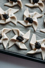 Scandinavian pastry Joulutorttu is traditional finnish and Swedish christmas pastry. It is traditionally made from puff pastry in the shape of a star or pinwheel and filled with prune jam