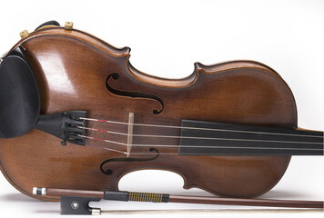 Closeup bow next violin on white background