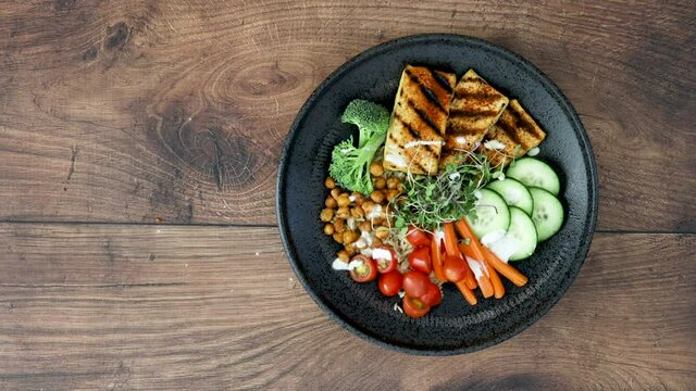Serving a Healthy Vegetarian Tofu Buddha Bowl