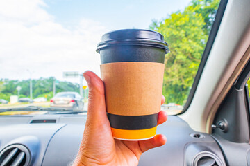 Mexican coffee to go holding while driving in Mexico.