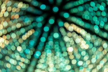 View to colorful bokeh, an abstract background with blurred lights or out-of-focus points of led lights, that can be used for decoration. 