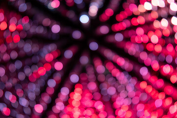 Colorful bokeh, an abstract background with blurred lights or out-of-focus points of led lights, that can be used for decoration. 