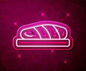 Glowing neon line Fish steak icon isolated on red background. Vector