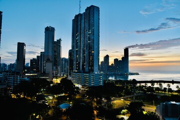 Panama City, the capital of Panama, is a modern city framed by the Pacific Ocean and man-made...