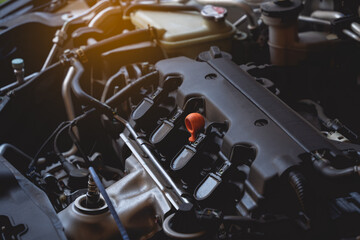 Under the hood of sports car. Powerful engine closeup. Close up detail of new car engine.Clean...