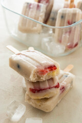 Fruit healthy berry ice cream. Homemade popsicle lolly with strawberries, blueberries and bananas.