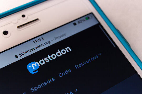 Kumamoto, JAPAN - Feb 8 2021 : Mastodon logo, free open-source software for running self-hosted social networking services (it has microblogging features similar to Twitter), on its website on iPhone
