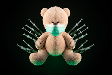 children's vaccination against the covid19 virus and vaccinations on the example of a teddy bear